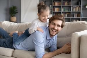 father and child covered with a serous illness cover policy