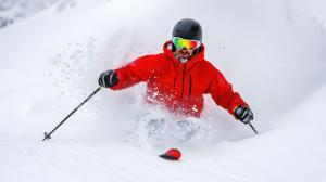 man skiing on the slopes covered by winter sports insurance