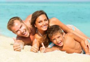 Family on holiday, passport and travel insurance reminder